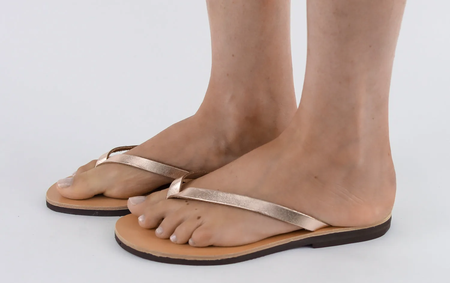 APHRODITE ROSE GOLD LEATHER FLIP-FLOPS