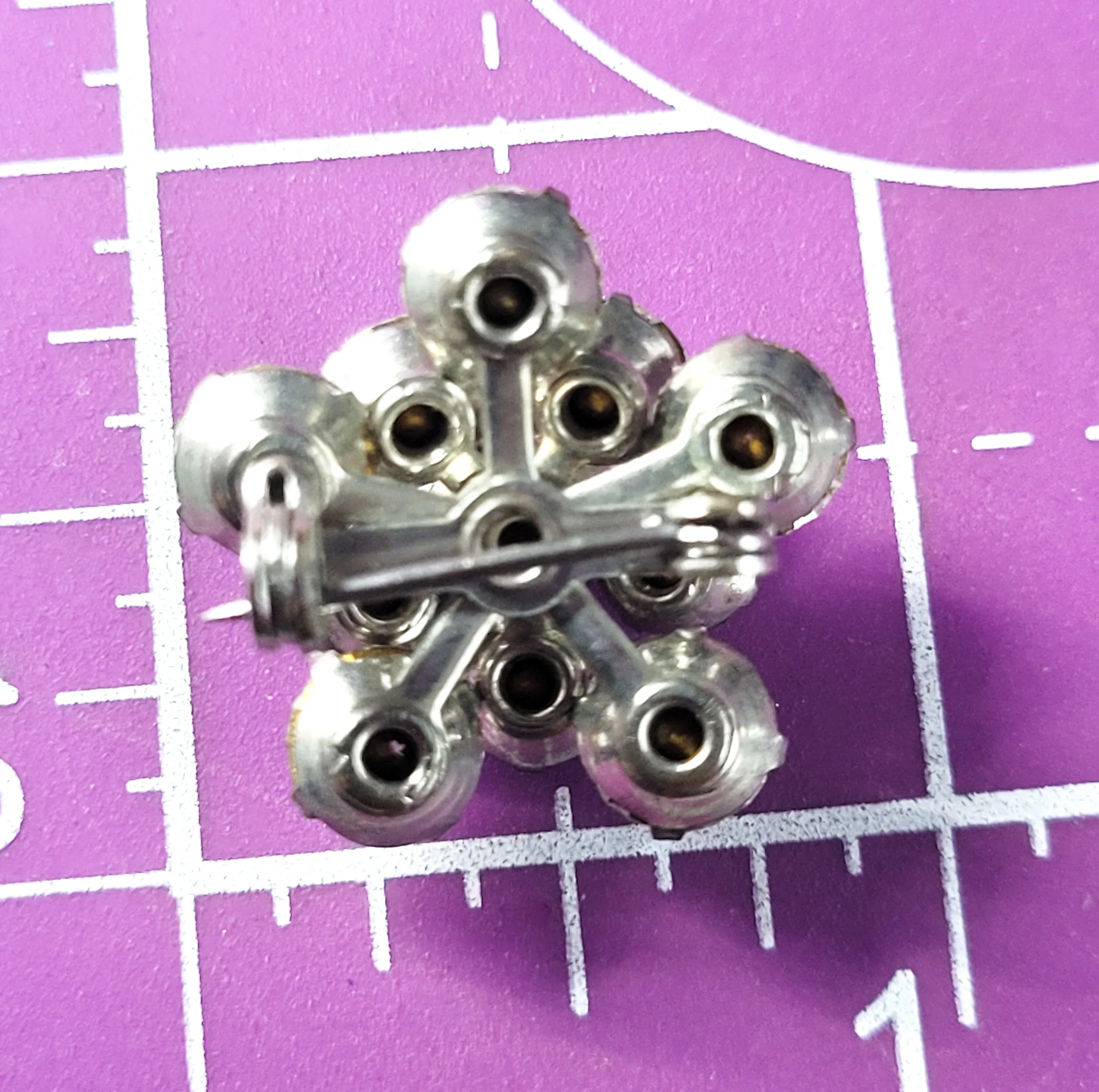 Bright clear rhinestone dimentional mid century flower vintage brooch
