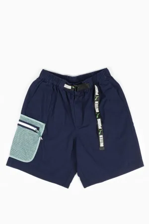 PUMA X BUTTER GOODS RIP STOP CARGO SHORT NAVY