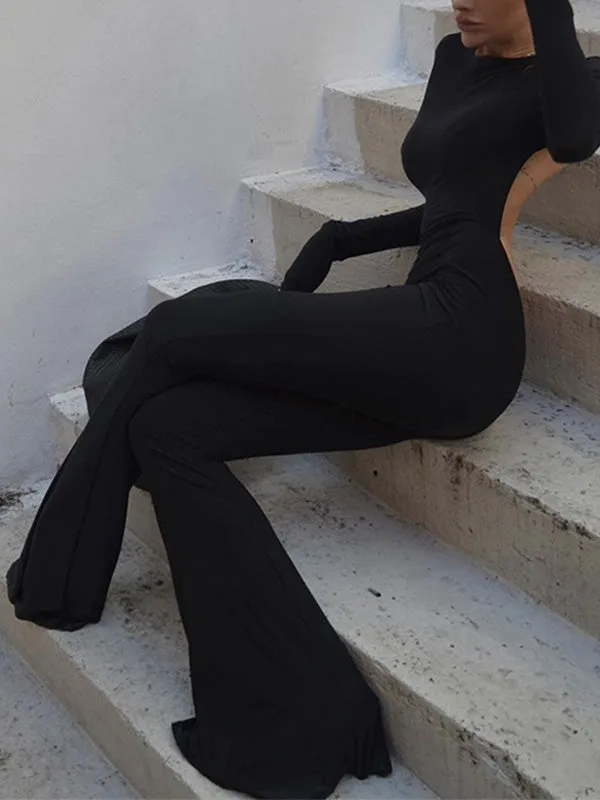 Schwarzer Vintage Jumpsuit mit Langen Ärmeln und Ausgestelltem Bein